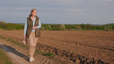 woman walking in a field