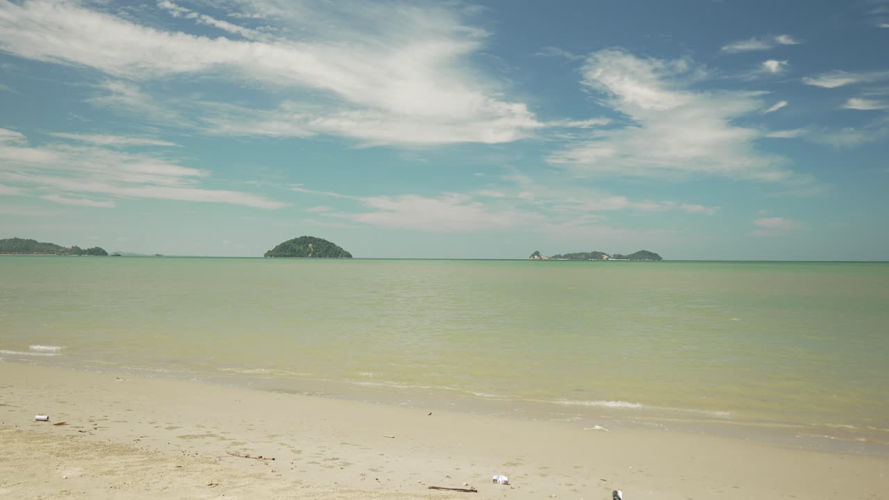 Lok Kawi Beach The Beach Sits Near Residentail Zone,With Its Shoreline Sea,Beds,Good For Casual Beach Time,During Sunset,With White Sandy Beach,Blue Sea Facing Few Island To The South China Sea