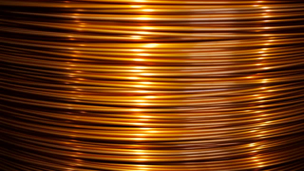 close-up of the rotation of the coil and wrap it copper wire. Manufacture of electric cable.