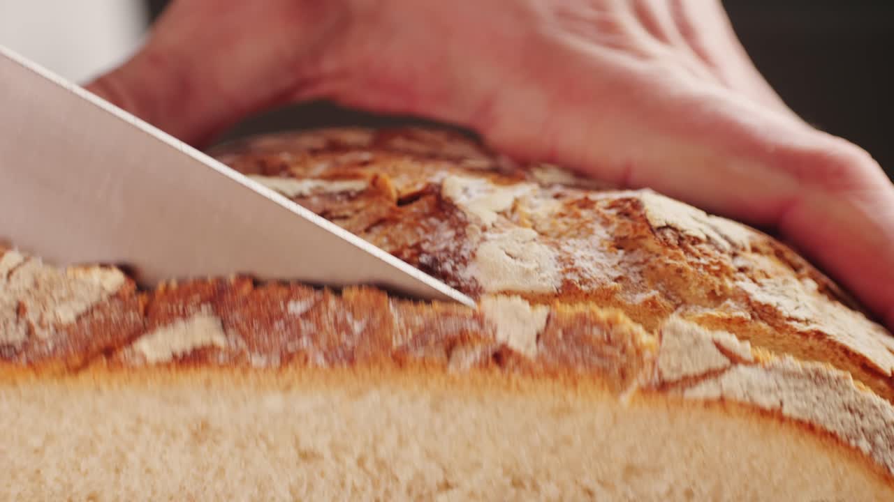 Cutting a Loaf of Artisan Bread