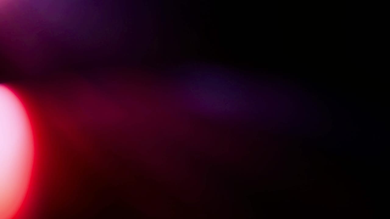Abstract Light Leaks and Colorful Flares on Black Background