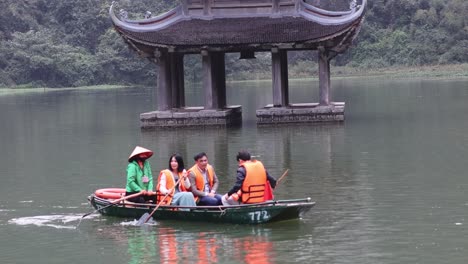 tourists enjoying a guided boat tour on a lake