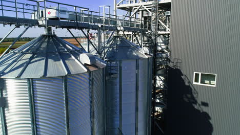 grain elevator. metal grain elevator in agricultural zone. aerial view.