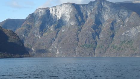 impressive towering mountains of sognefjord in norway