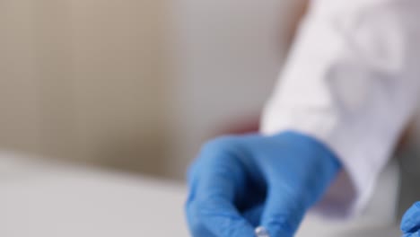 preparation of a tablet capsule in the pharmacy - macro and slow motion