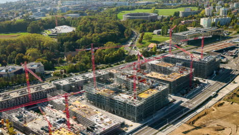 Tower-Cranes-At-The-Construction-Site-Next-To-the-University-Of-Lausanne,-In-Chavannes-Pres-Renens,-Vaud,-Switzerland