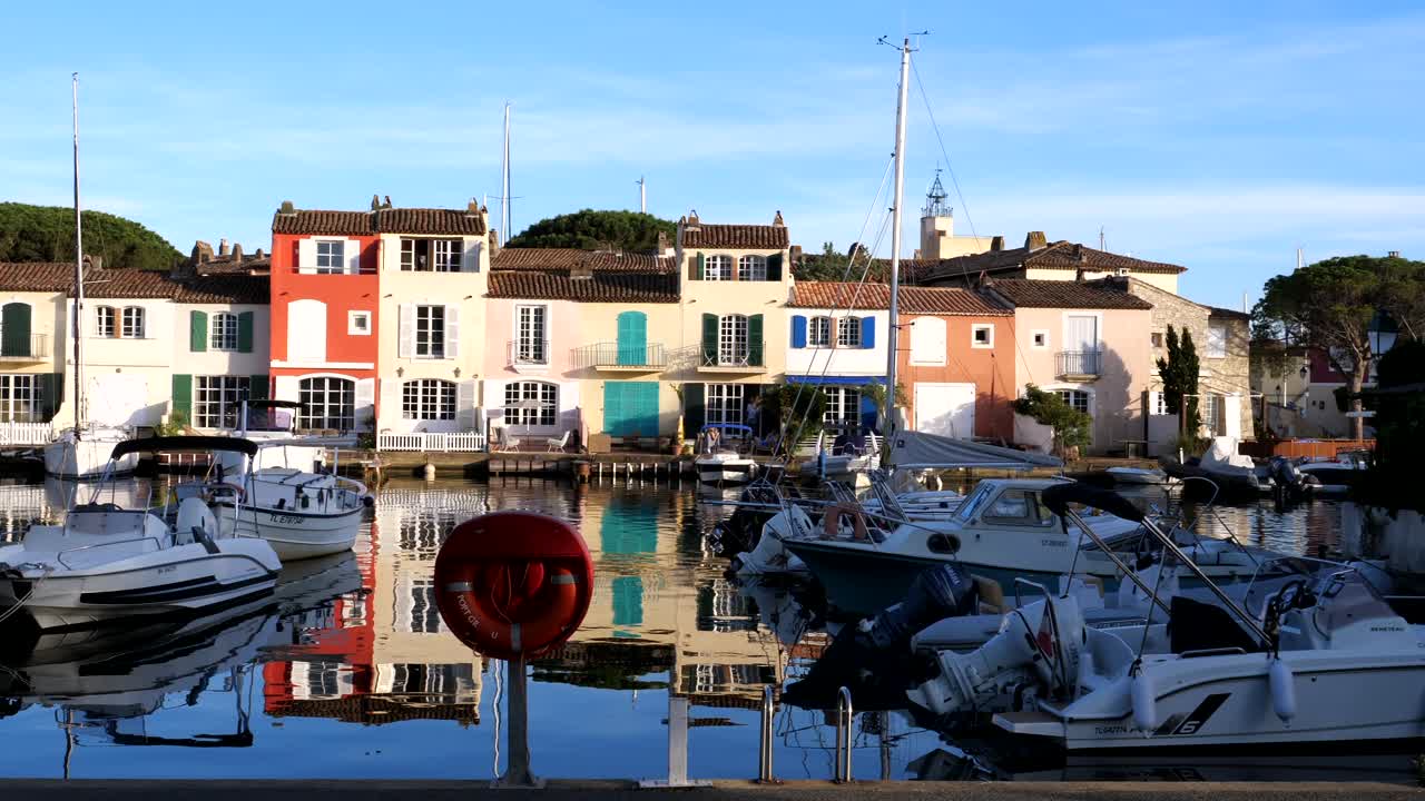 Docking boats and yachts at pier of Port Grimaud in France