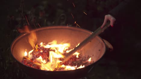 red and hot coals shimmer beautifully in the dark