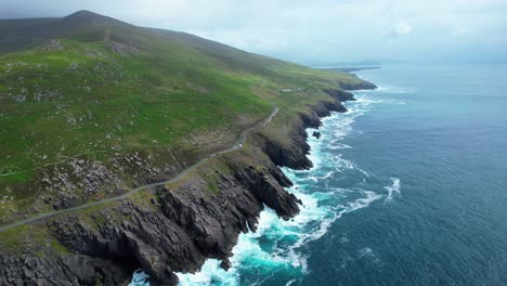 slea head drive road high above cliffs and breaking waves and atlantic swell kerry ireland epic locations
