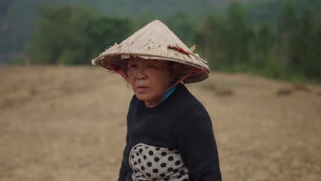 elderly farmer in a field