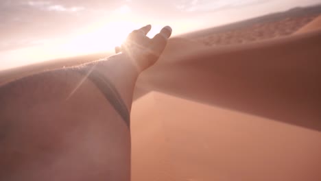 a beautiful sunrise in the middle of merzouga sahara desert