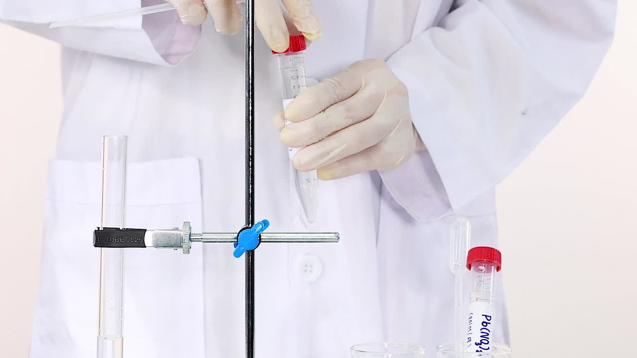 Demonstration of precise liquid measurement using a burette in a laboratory setting.