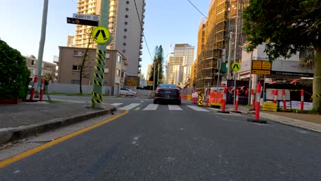 car navigating roadworks in urban gold coast area