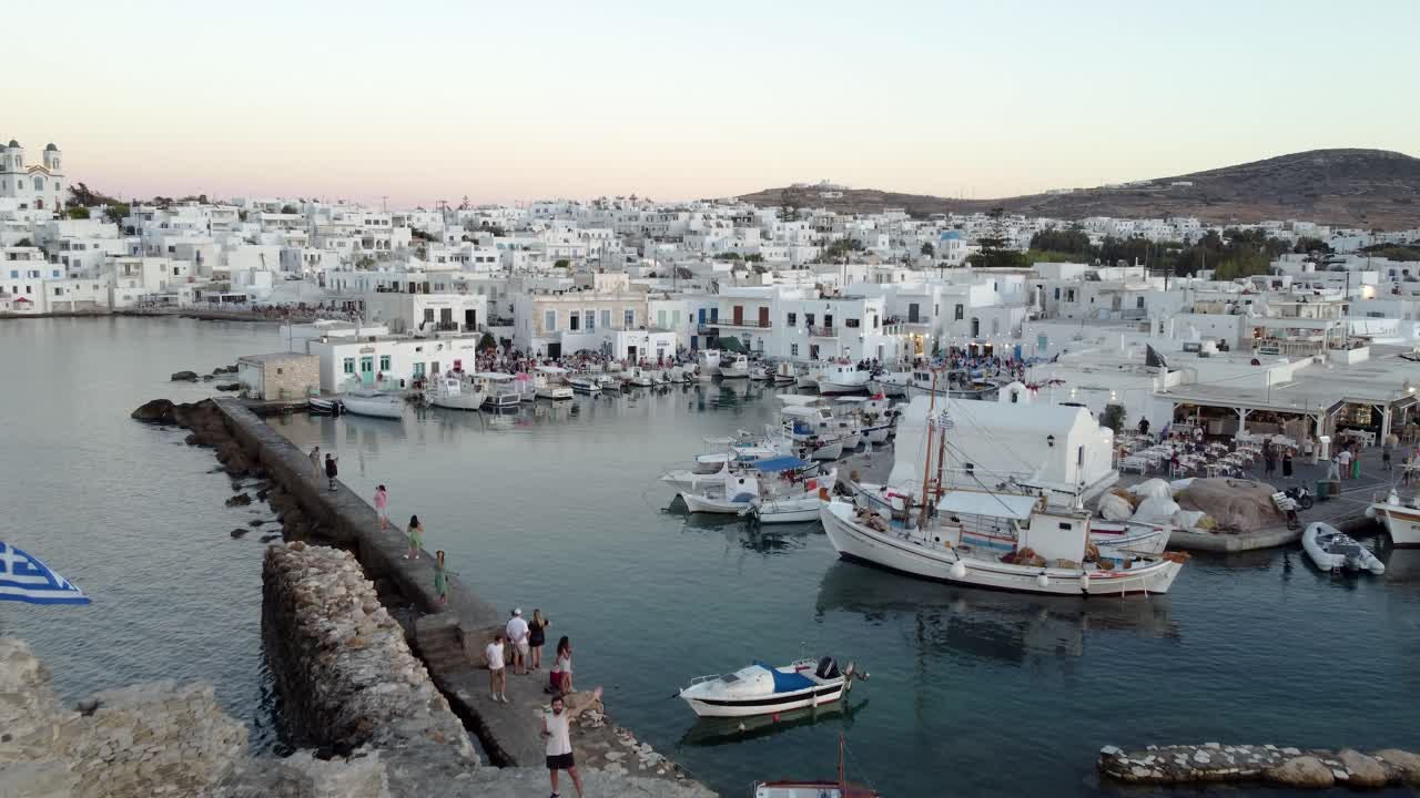 Aerial over Venetian Castle, Village and Marina of Naousa in Paros Island, Greece