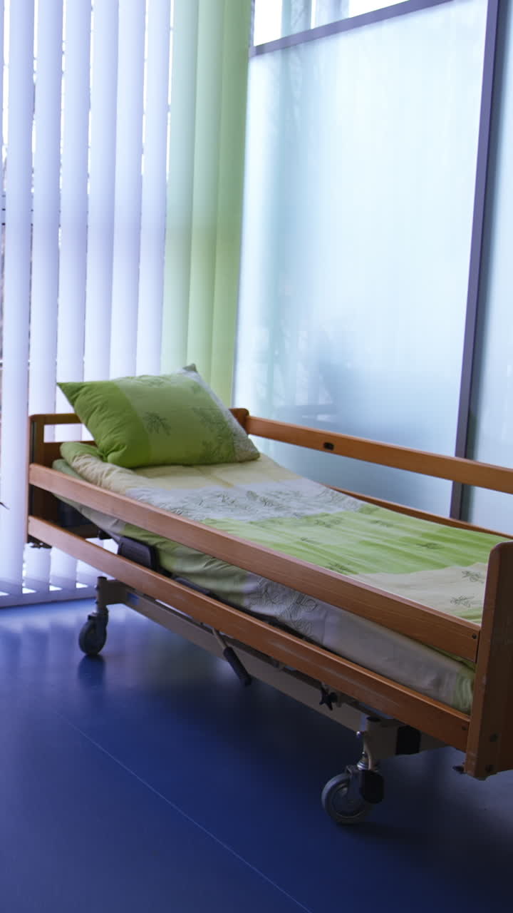 Nice empty ward with two beds in stomatological clinic. Little cozy room for dentist's patients. Health care concept. Vertical video