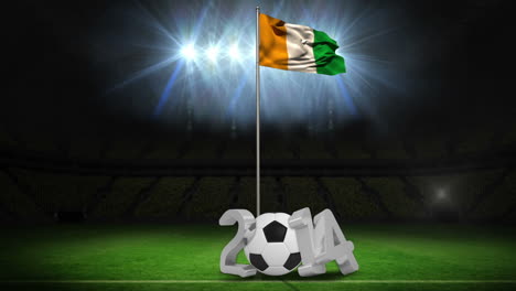 ivory coast national flag waving on flagpole with 2014 message