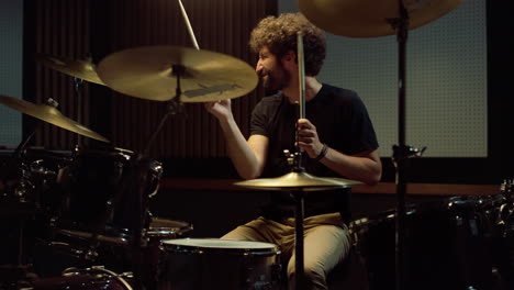 Energic-drummer-playing-on-drum-set