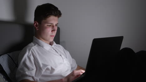 Teenage-Victim-Of-Cyber-Bullying-Using-Laptop-Shot-On-R3D