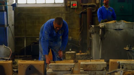 male worker working in workshop 4k