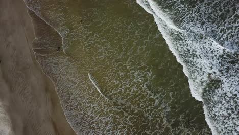 Incredible-aerial-shot-of-waves-in-the-ocean-beach-of-Itanhaem