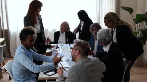 multiracial business people working inside bank office - meeting and startup concept