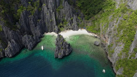 aerial shot of distinctive rock formation in el nido, palawan, philippines