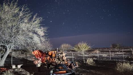 Timelapse-at-night-with-stars-moving-in-the-background