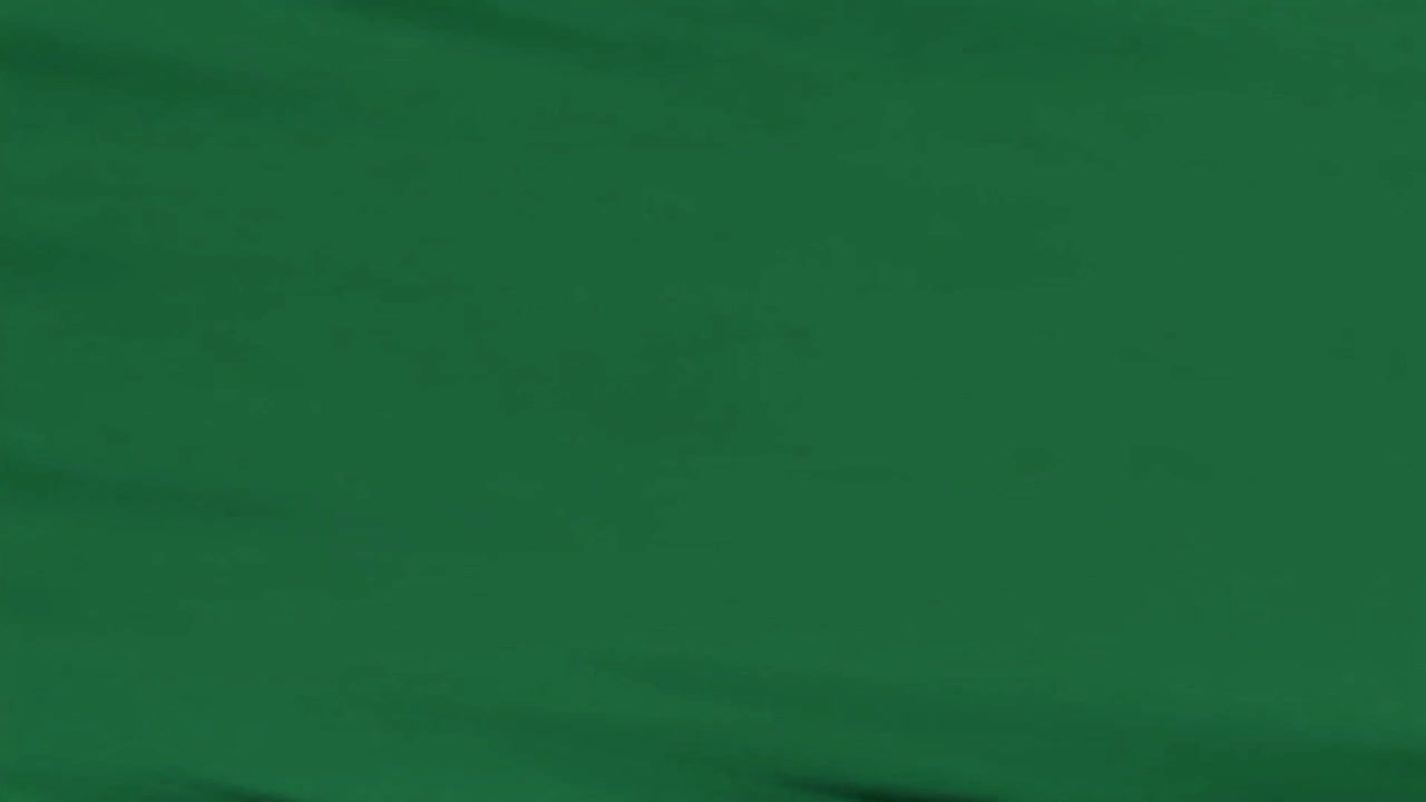 Tecido Verde Abstrato Ondulando ao Vento
