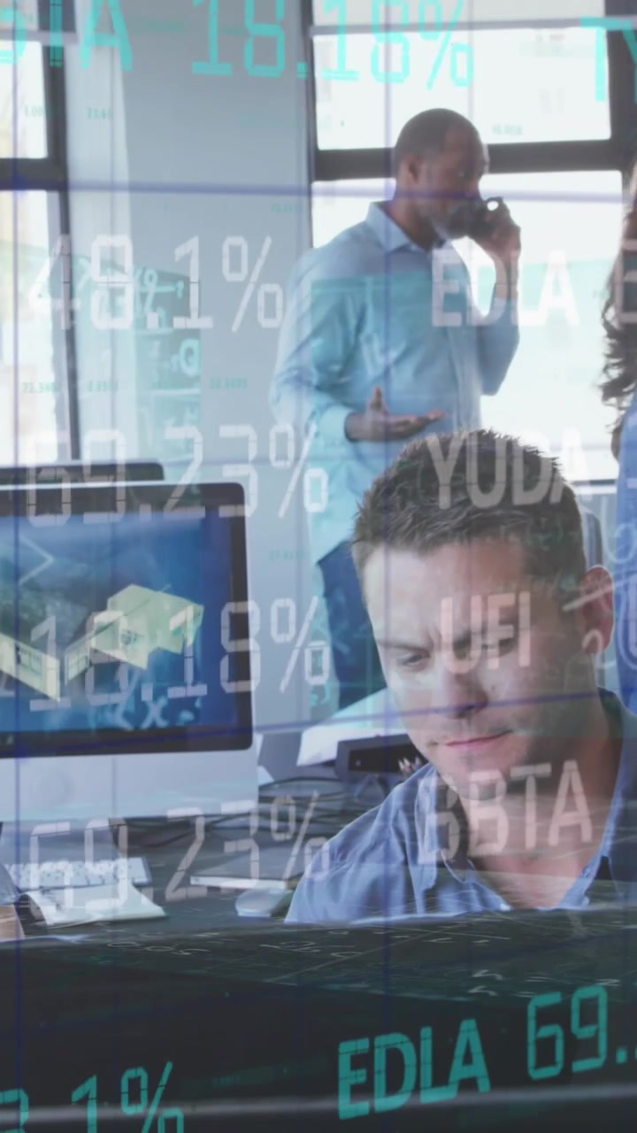 Animation of financial data over diverse businesspeople working on computer in office