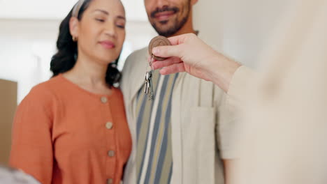Realtor,-couple-and-new-home-with-giving-keys