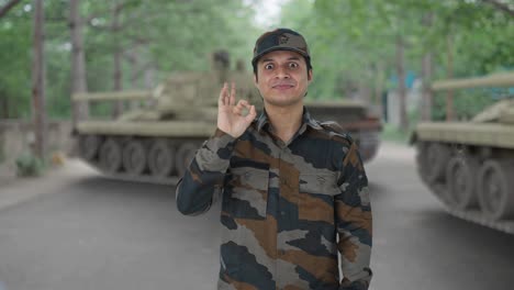 happy indian army man showing okay sign