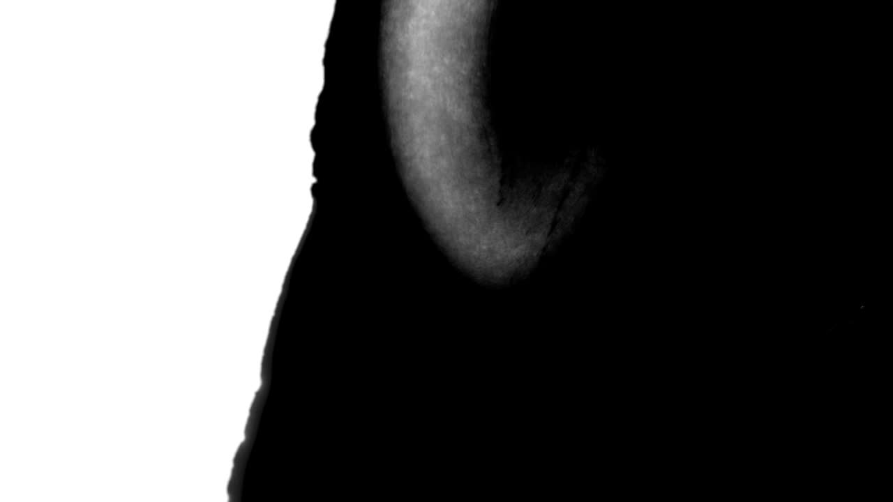 diseño de gotas de tinta negra sobre fondo blanco