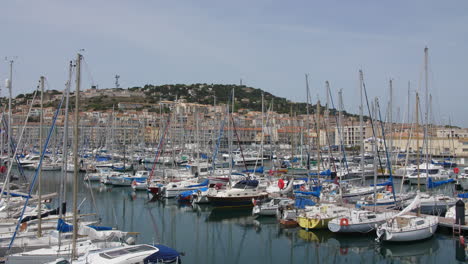 boats in harbor sete docked vessels mont saint clair in background france