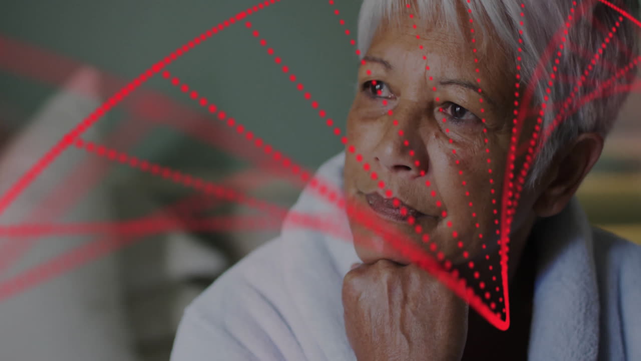 senior woman resting chin on hand indoors, featuring technology theme with red laser overlays