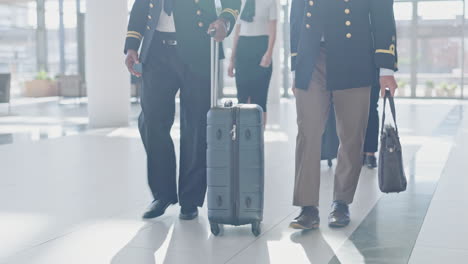 luggage, airport and pilot walking together