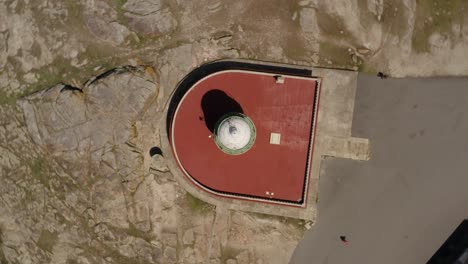 360-top-down-view-of-Faro-de-Corrubedo,-Galicia,-La-Coruna,-Spain