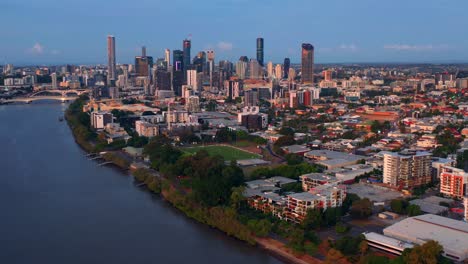 skyline of toowong at sunset in brisbane, queensland, australia - aerial drone shot