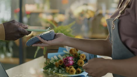 payment at a flower shop