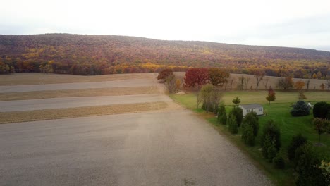 Aerial-lowering-of-an-agricultural-area-of-Hamburg,-Pennsylvania-in-the-fall