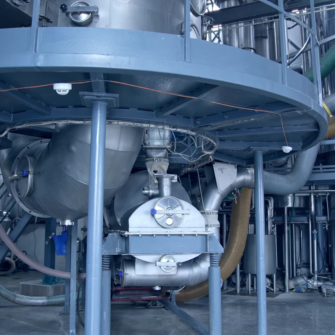 Modern food pipelines technology. Big steel construction of milk factory