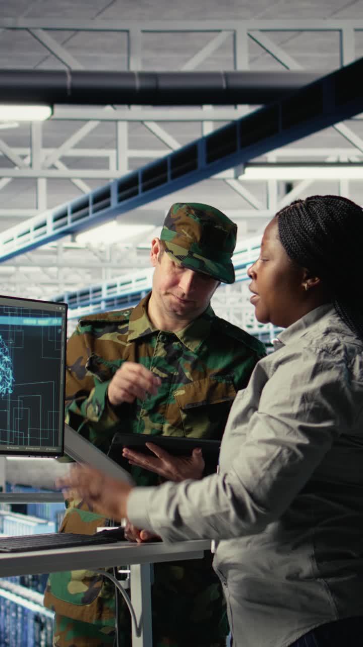 Vertical Video Army Experts In Server Room Use Artificial Intelligence Program