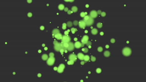 flying green round particles with glitters on fashion black gradient
