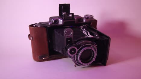 Close-Up-of-Folding-Vintage-Soviet-Photo-Film-Camera-Moskva