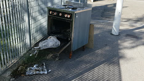discarded oven and stove