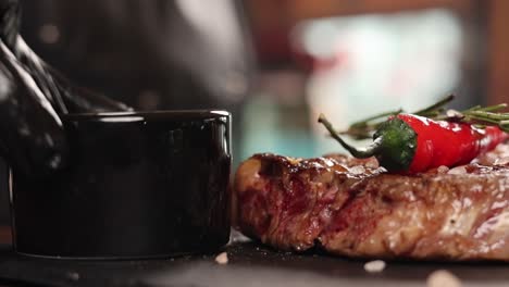 chef serving a delicious steak