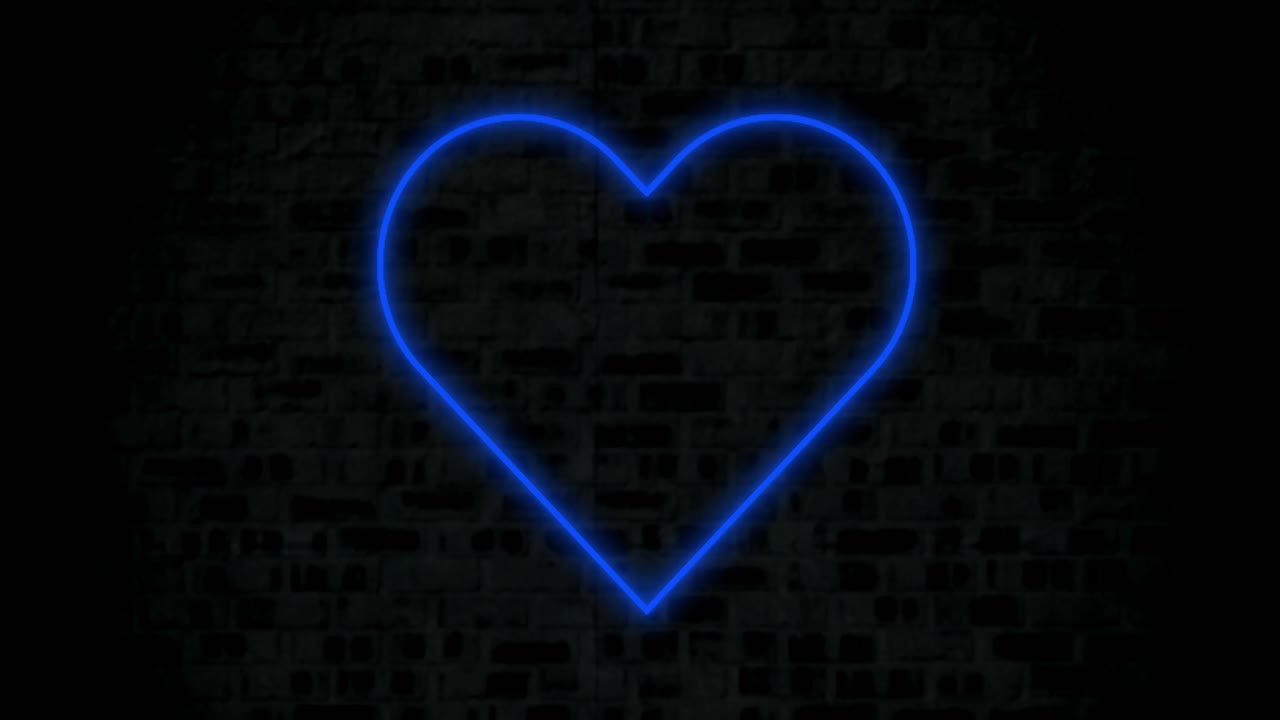 animación de un corazón de neón azul que parpadea sobre un fondo negro