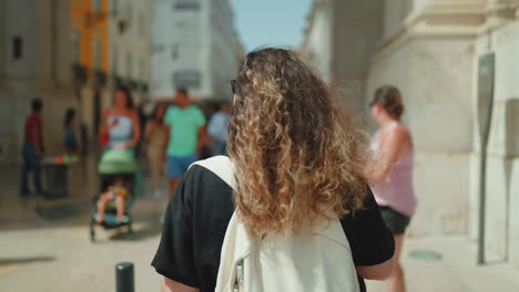 woman walking in a city street