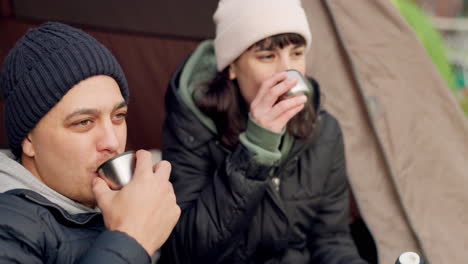 couple, drinking coffee and relax in tent