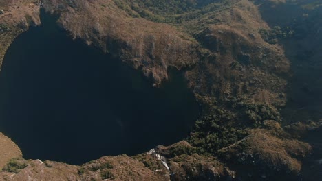 4k aerial drone footage over the 1st lagoon of pichgacocha from ambo, huanuco, peru in the andes mountains