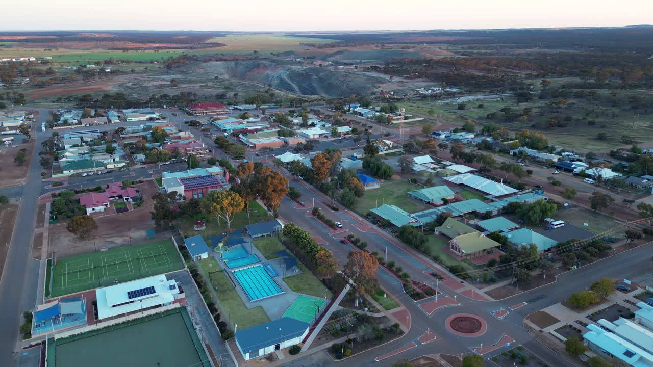 Australian outback mining town with open-pit gold mine supporting economny